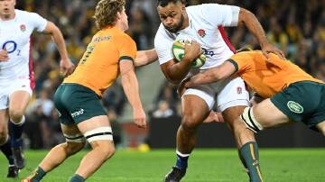 England's Billy Vunipola is tackled during a 2022 Test between England and Australia at the SCG. (Dean Lewins/AAP PHOTOS)