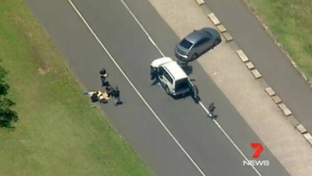 The police operation at Centennial Park.  Photo: Seven News