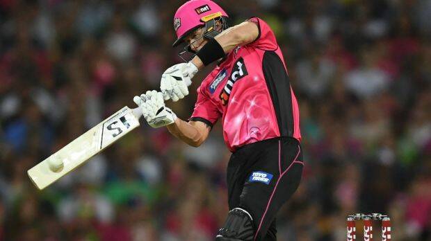 Mainstay: Joe Denly hits a six en route to piloting the Sixers to victory. Photo: AAP