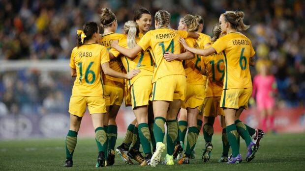 Good as gold: Matildas players celebrate Sam Kerr's first goal of a brace. Photo: Darren Pateman