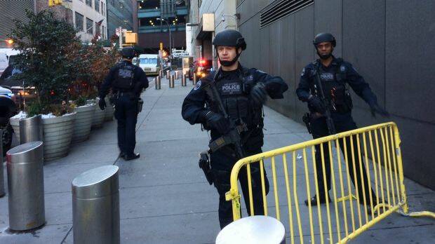 Police block off a footpath while responding to a report of an explosion near Times Square. Photo: AP
