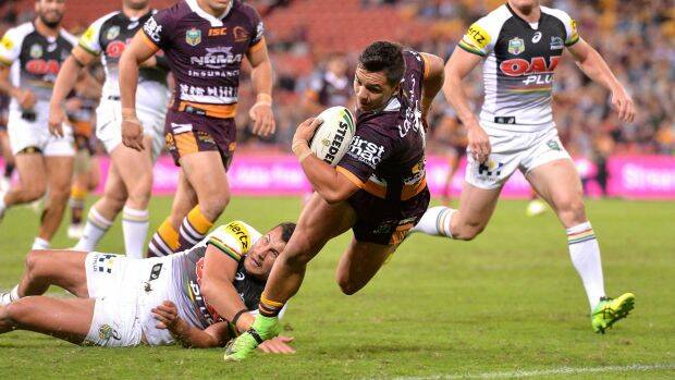 All-rounder: Kodi Nikorima of the Broncos scores a try in just one example of the halfback's many contributions during Thursday night's game against Penrith. Photo: Bradley Kanaris