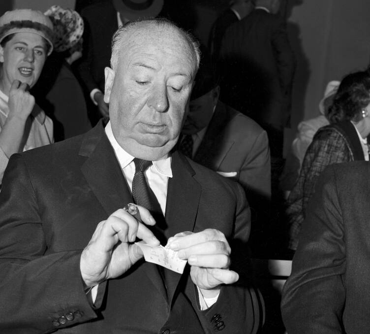 Alfred Hitchcock tears up his losing ticket during the visit to Warwick Farm Racecourse on May 7, 1960. Picture: John O'Gready