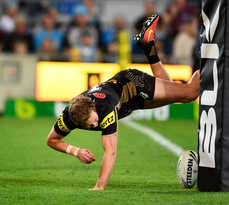 Highlights from the round 25 NRL match between the Gold Coast Titans and the Penrith Panthers at Cbus Super Stadium on August 27 on the Gold Coast. Photo by Ian Hitchcock/Getty Images