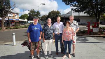 Peter Williams (second from left) with supporters Steve, Daniel Makovec, from One agency, Michael Goldrick and Janet Goldrick in the Engadine CBD. Picture by Chris Lane 