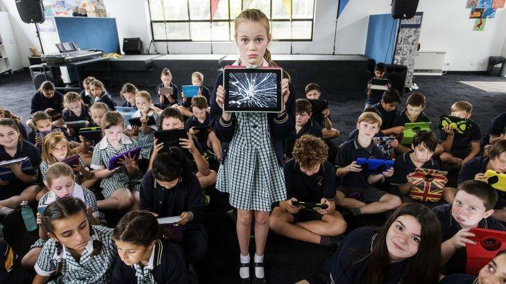 Grade 6 student Rose at Donvale Primary School. With the use of iPads has come a new set of rules and a whole lot of shattered screens.  Photo: Paul Jeffers
