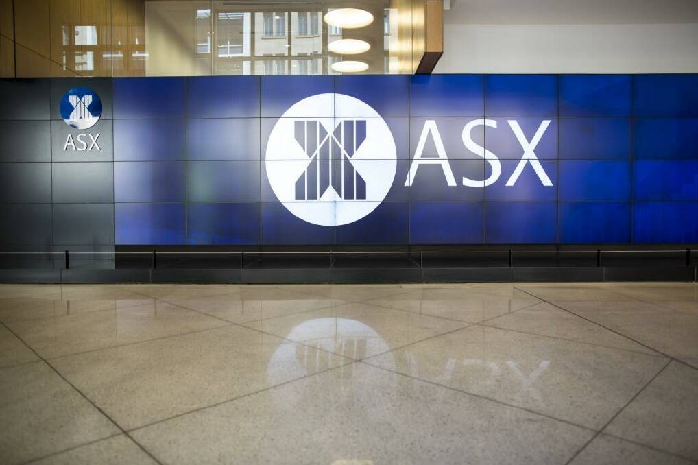 For 2014, the benchmark S&P/ASX 200 Index edged up just 1.1 per cent to 5411 points. Photo: Angus Mordant