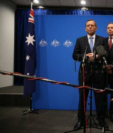 Not our policy: Prime Minister Tony Abbott and Immigration Minister Peter Dutton. Photo: Andrew Meares