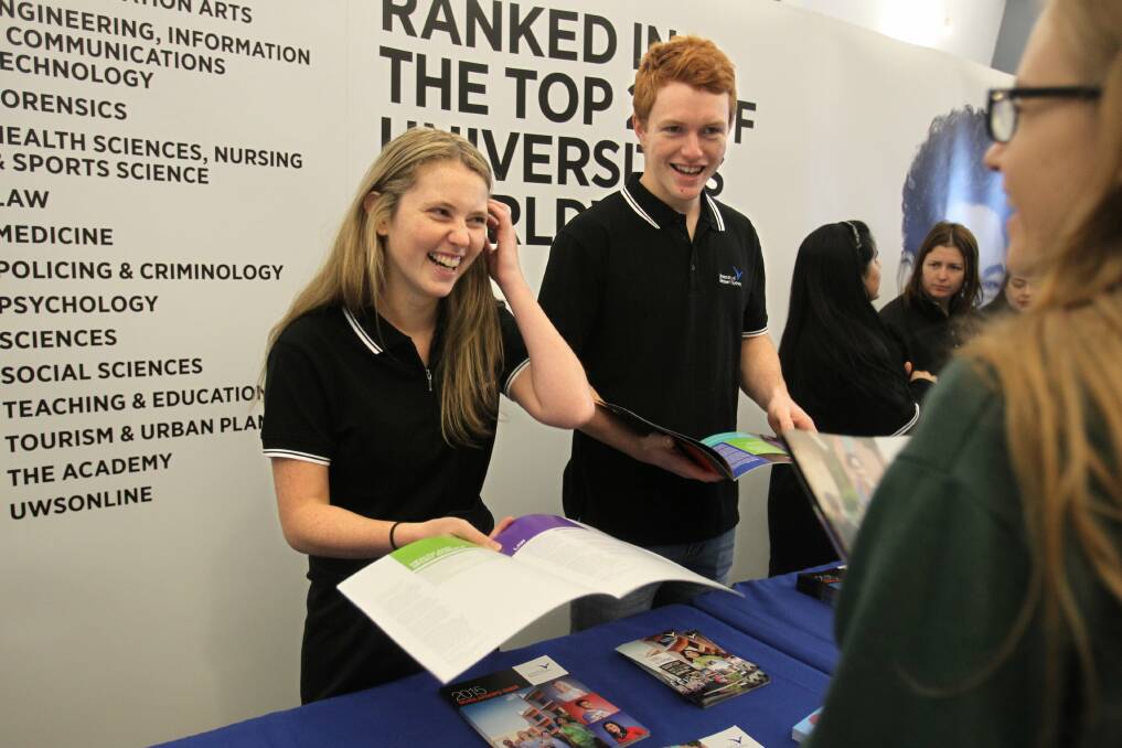 Looking forward: Jordan McPherson (centre) at the Nepean Careers Market on Friday — day two of the expo.Picture: Gene Ramirez