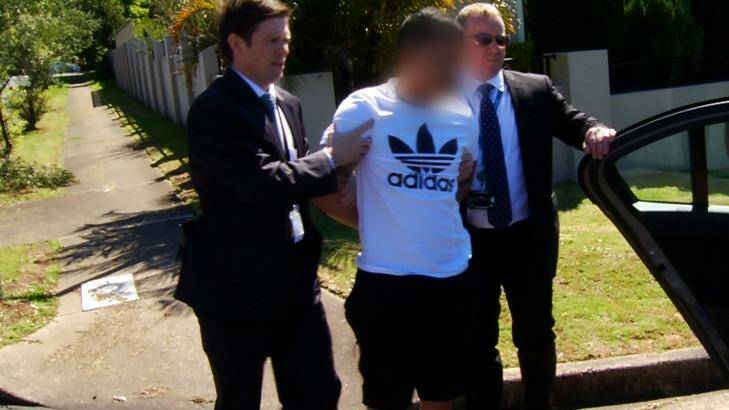 NSW Police arrest Kevin Ly over the alleged murders of drug cook Son Thanh Nguyen and girlfriend Thi Kim Lien Do in Canley Vale in 2013. Photo: NSW Police