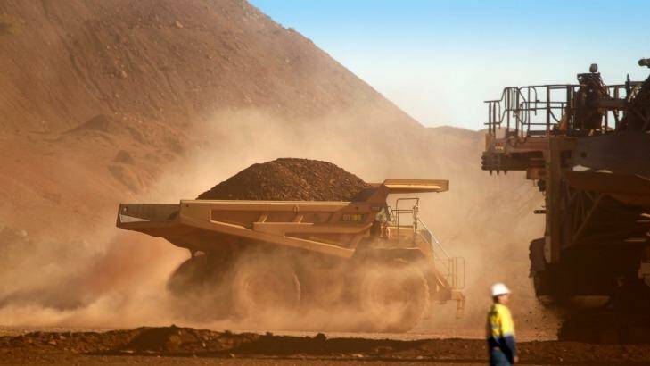 A string of analysts have taken the knife to iron ore price forecasts in the first few weeks of the year, tipping it will average in the $US60s for 2015. Photo: Quentin Jones