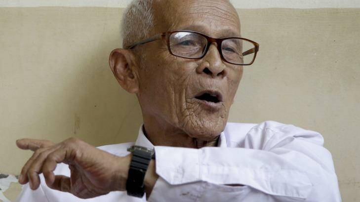 Kusnendar, a survivor of the 1965 crackdown, speaks to a reporter at a nursing home in Jakarta in September 2015.  Photo: Tatan Syuflana