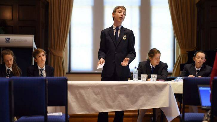 Norfolk student Harrison Hayes speaks at the Premier's Debating Challenge State Championships at Sydney University. Photo: Nick Moir 