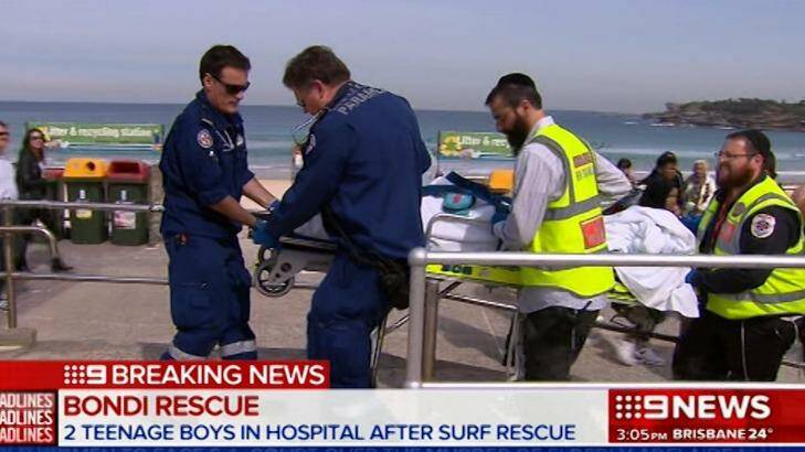 One of the students is transported to hospital. Photo: Nine News