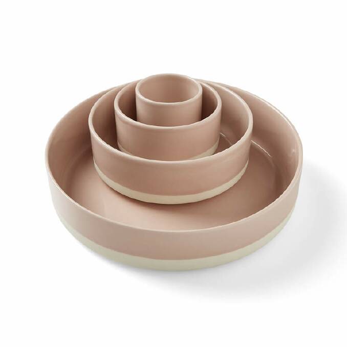 These ceramic nesting bowls are the perfect way to serve a range of salads and sides. Think long trestle tables for alfresco dining. Set of four, $79.95, aurahome.com.au. Photo: Supplied