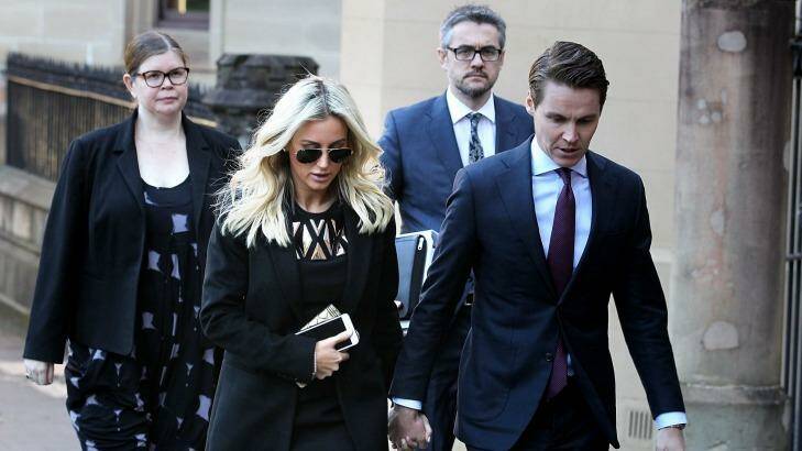 Oliver Curtis and wife Roxy Jacenko arrive at St James Supreme Court on Monday. Photo: Ben Rushton