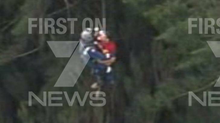 Passengers being winched to safety in Nattai National Park. Photo: Channel Seven