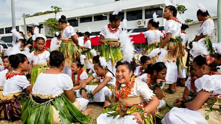 Primary school children prepare to dance and sing before King Tupou and the nobles.  Photo: Edwina Pickles