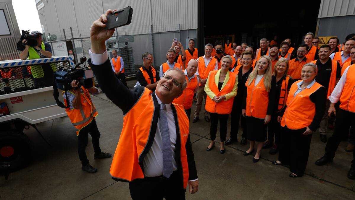 Prime Minister Scott Morrison taking a selfie. Picture: Jonathan Carroll 