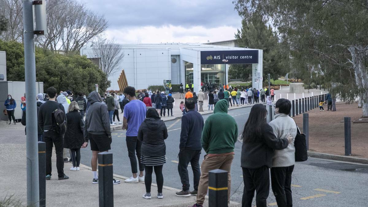 The line outside the ACT government's mass vaccination clinic at the AIS Arena on Monday afternoon. Picture: Keegan Carroll
