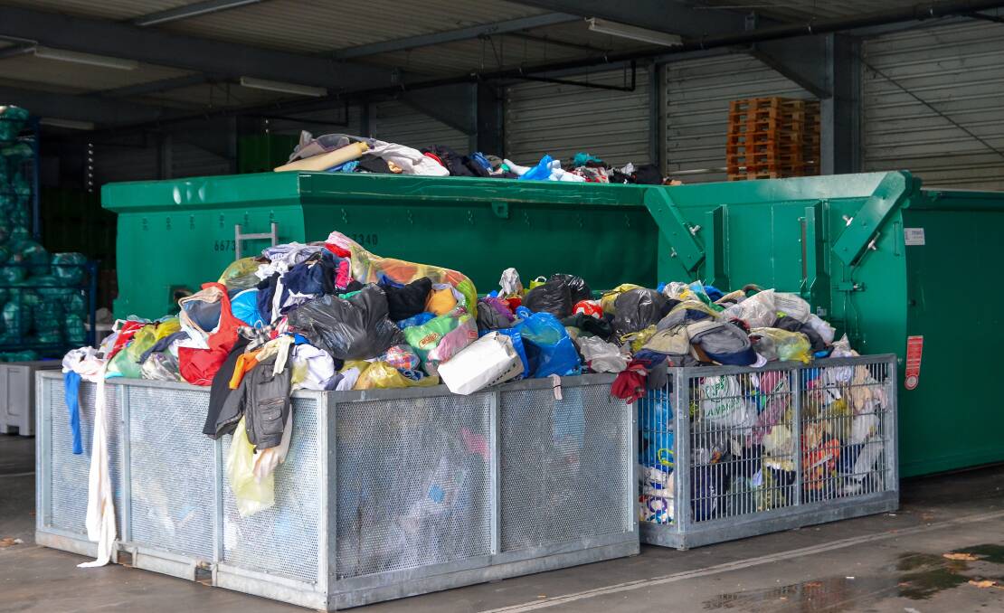 Binloads of discarded clothing, a shameful by-product of the 21st century garment industry. Picture: Shutterstock