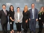 Multiculturalism Minister Mark Coure, Joudy Lazkany (Head of Employment Services, SSI), Holsworthy MP Melanie Gibbons, Violet Roumeliotis (SSI chief executive) CEO, SSI, Skills and Training Minister Alister Henskens, Natalie Bartolo (RESP program manager, SSI).