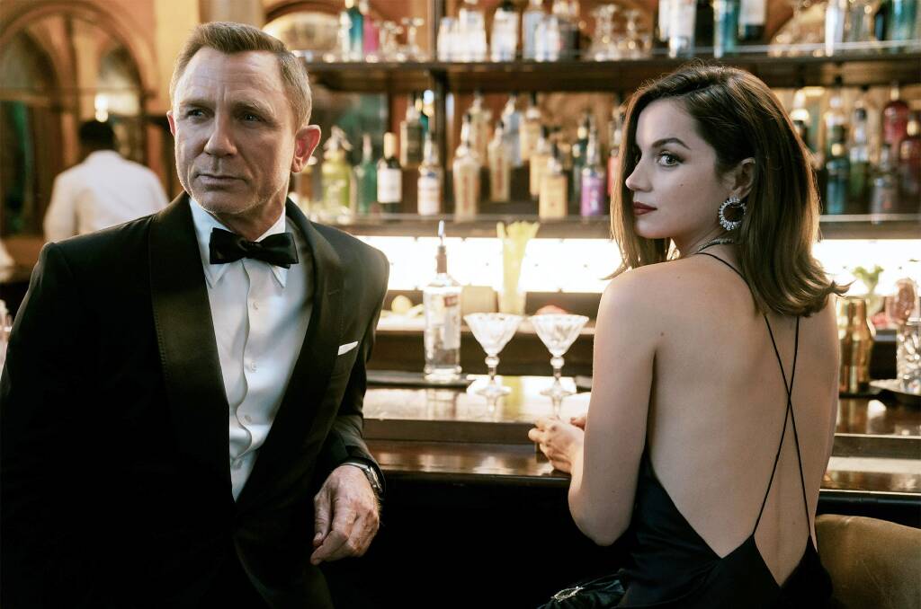 Bond is back: The long-awaited 25th James Bond film brings Daniel Craig to the screen for his final outing, alongside Ana de Armas, in No Time to Die, rated M, in cinemas now. Picture: MGM 