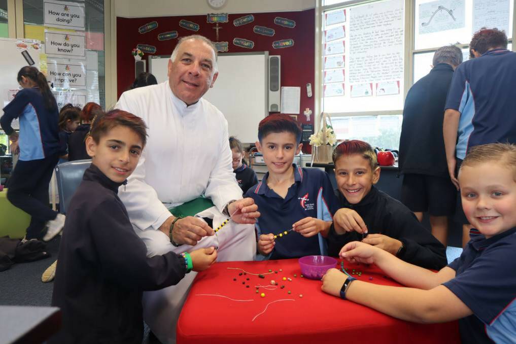Leading by example: Brother Nicholas Harsas is principal of Holy Spirit Catholic Primary School Carnes Hill and has been a Catholic educator for 35 years. Picture: Supplied