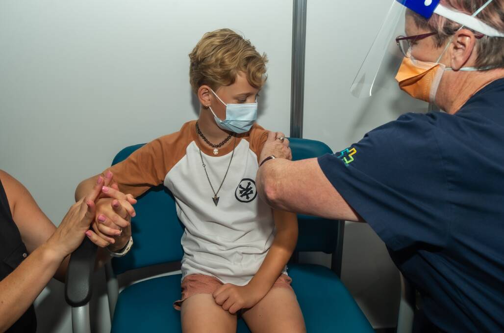 Ten-year-old June Tattam gets a COVID vaccine. Picture: Karleen Minney 