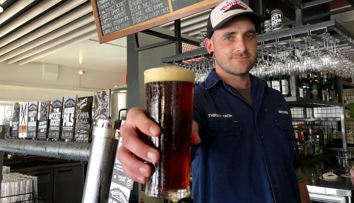 CHEERS: Braddon Archer from the Thirsty Crow Brewery has spent a month perfecting the Anzac Biscuit Beer, available at Wagga RSL on Anzac Day. Picture: Stephen Mudd.