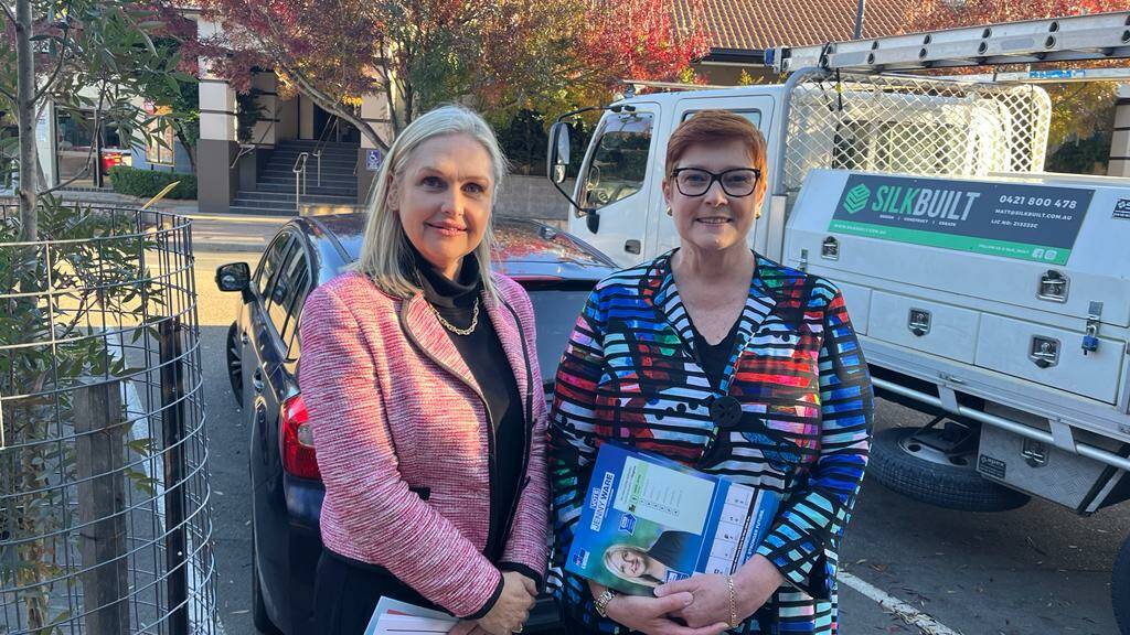 Jenny Ware with the Minister for Foreign Affairs and Minister for Women, Senator Marise Payne at the Engadine early voting centre during the week before the election. Picture: supplied