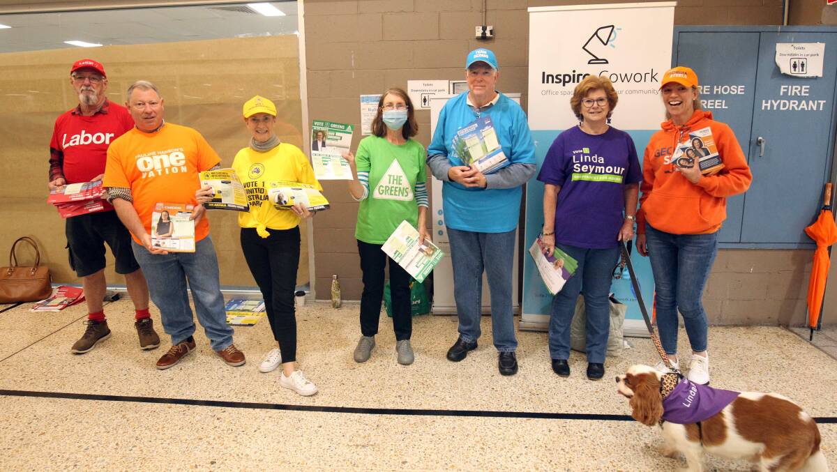 Campaign volunteers for the seven candidates in Hughes at the Miranda early voting centre: Picture: Chris Lane 
