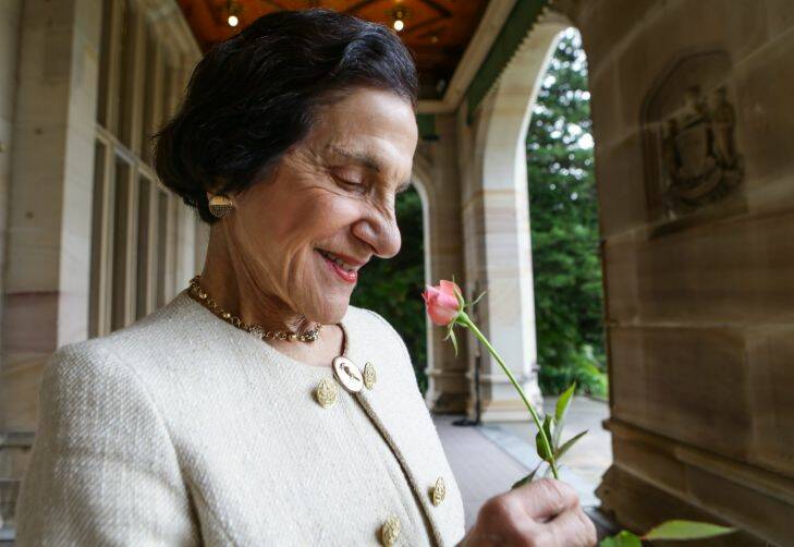 SMH NEWS 
Dame Marie Bashir with the rose named in her honour, the Governor Marie Bashir Rose at Government House. 30th June 2015.
Photograph Dallas Kilponen