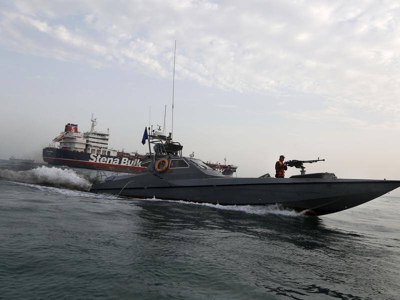 Iran's Revolutionary Guards defied a British warship when they seized an oil tanker in the Gulf.