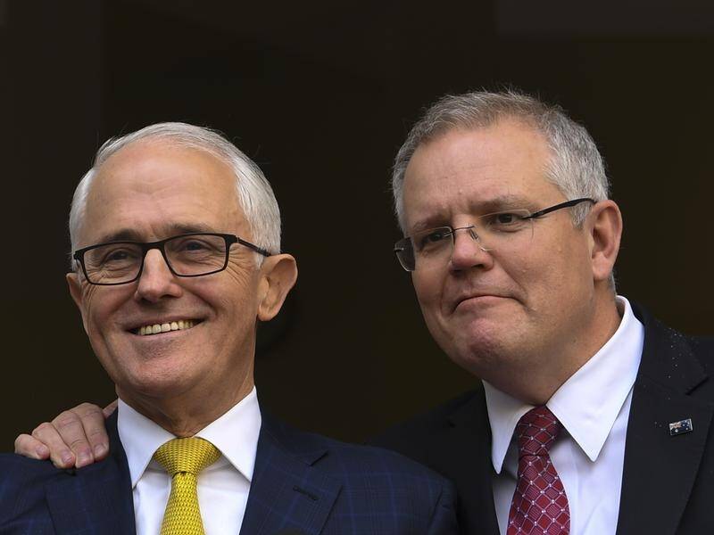 Former prime minister Malcolm Turnbull with the man who replaced him, Scott Morrison, last year.