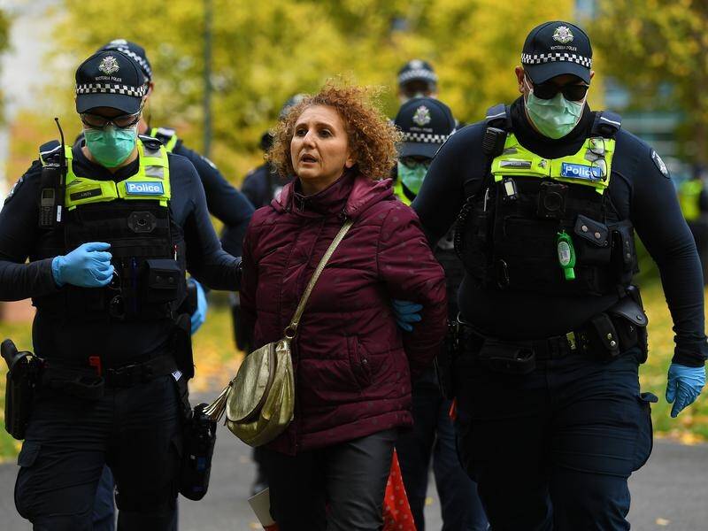 At least 10 people have been arrested at a march in Melbourne protesting tough restrictions.
