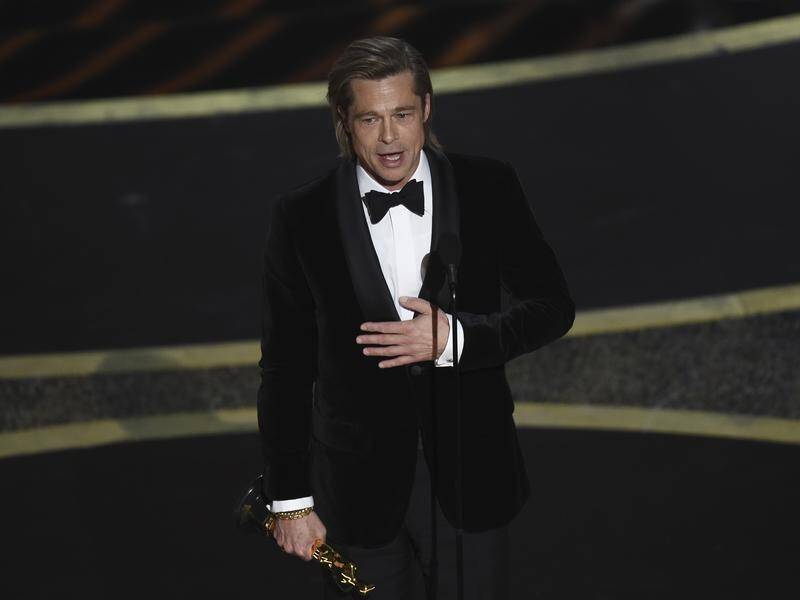Veteran leading man Brad Pitt has won best supporting actor - his first Oscar for acting.