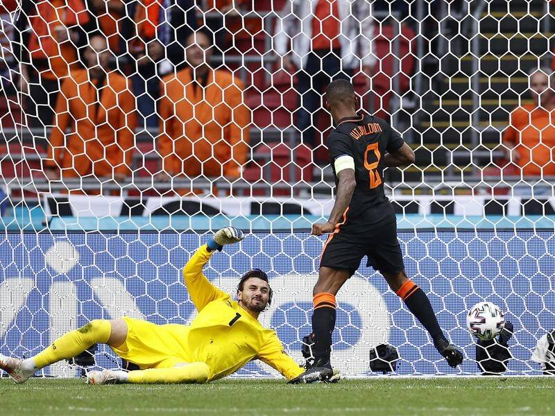 Holland's Georginio Wijnaldum scores as his team beat North Macedonia in their Euros match.