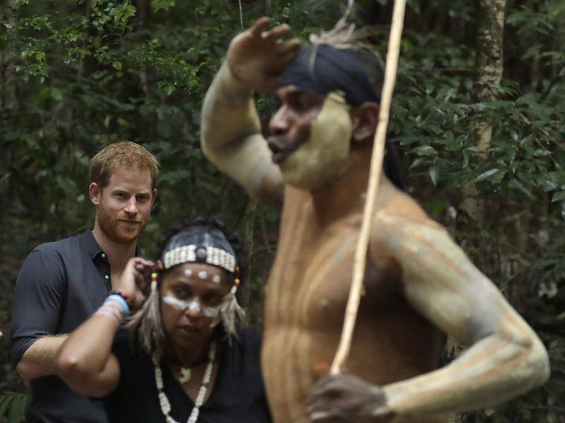 Prince Harry was welcomed to Fraser Island with a traditional dance by the Butchulla people.