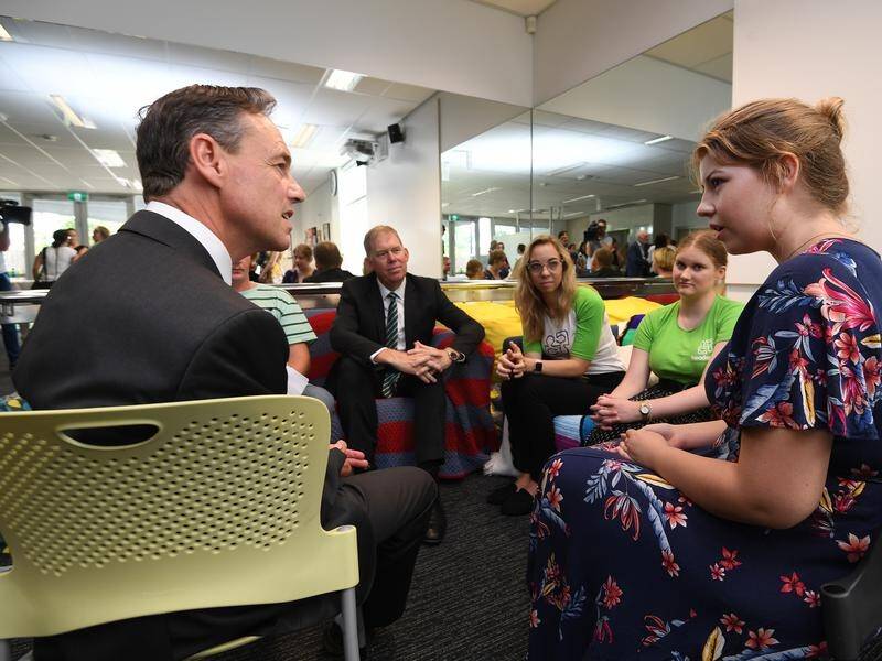 Health Minister Greg Hunt met with Headspace clients after announcing a $110 million funding boost.
