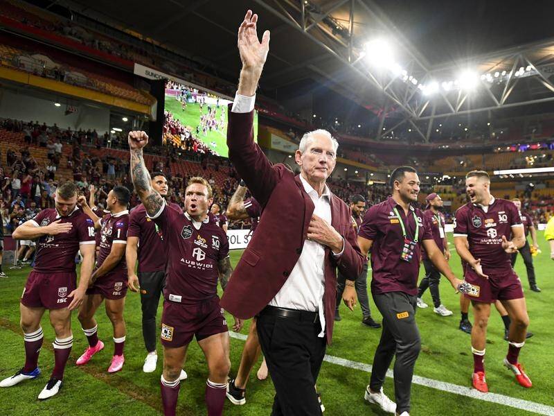 Wayne Bennett has stepped down as Queensland coach to focus on South Sydney's NRL title hopes.