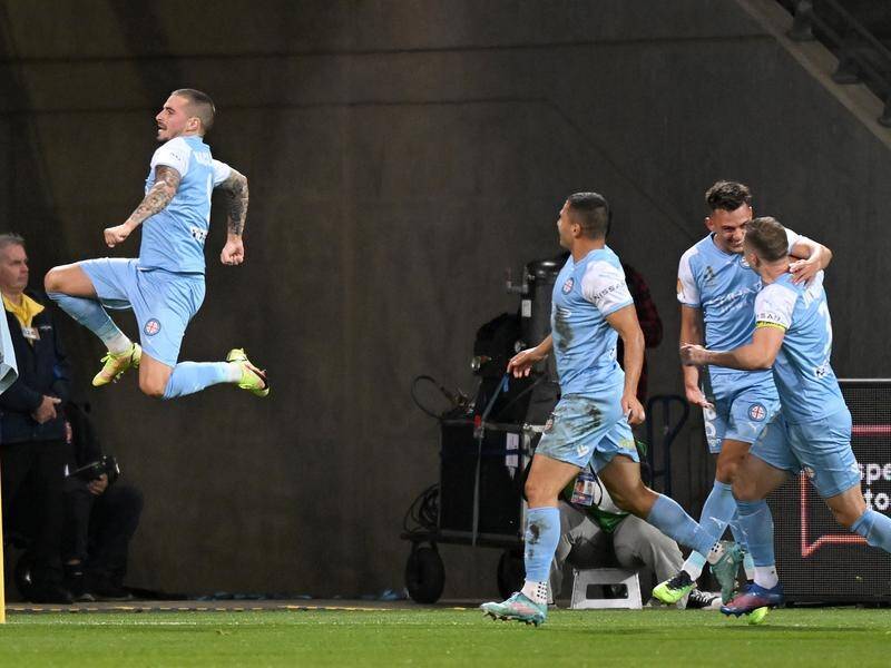 Jamie Maclaren (l) clinched a fourth golden boot as Melbourne City secured the ALM premiership.