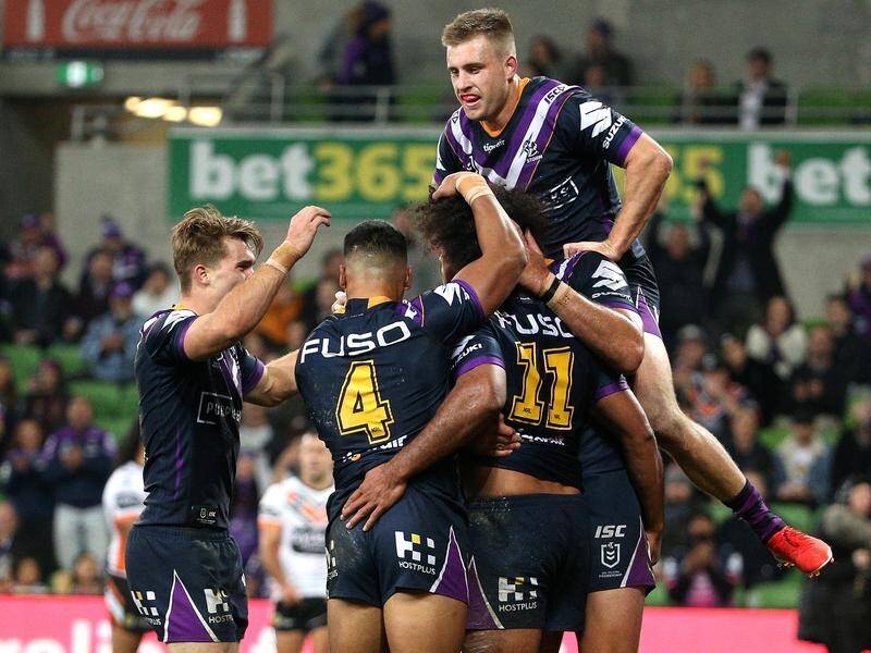 The Melbourne Storm have fought back in the opening match of round 10 to pip the Wests Tigers 24-22.