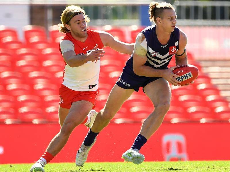 Fremantle's Nat Fyfe is confident of playing round one after post shoulder surgery complications.