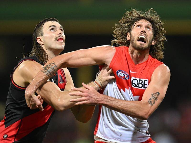 A toe injury has sidelined Sydney ruckman Tom Hickey (r) for their AFL match against Richmond.