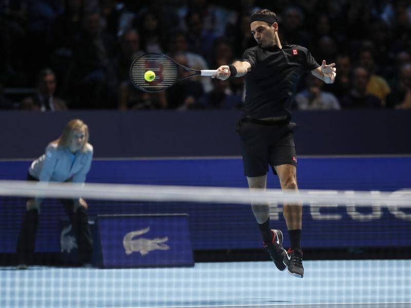 Roger Federer claimed a straight-sets victory over Matteo Berrettini at the ATP Finals in London.