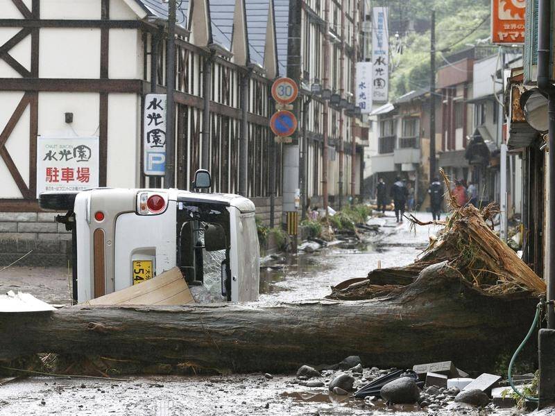 At least 66 people have died in flooding and mudslides in Japan, and there's more rain to come.