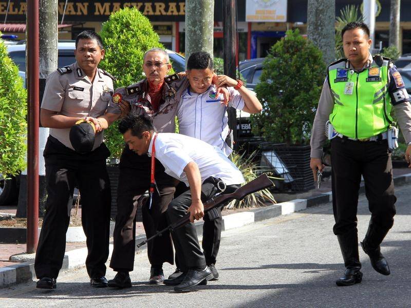 Indonesia has passed tough new terror laws following suicide attacks in the city of Surubaya.