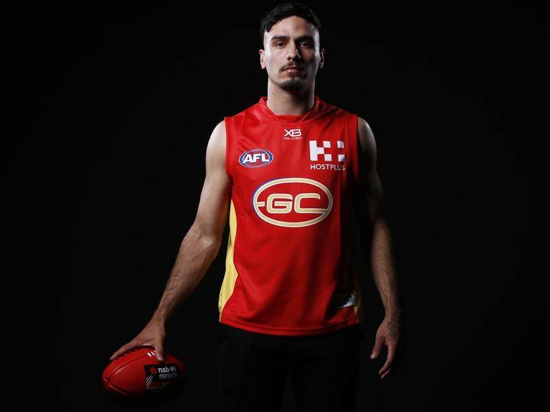 The AFL debut of Gold Coast's Izak Rankine will come after the coronavirus shutdown is lifted.