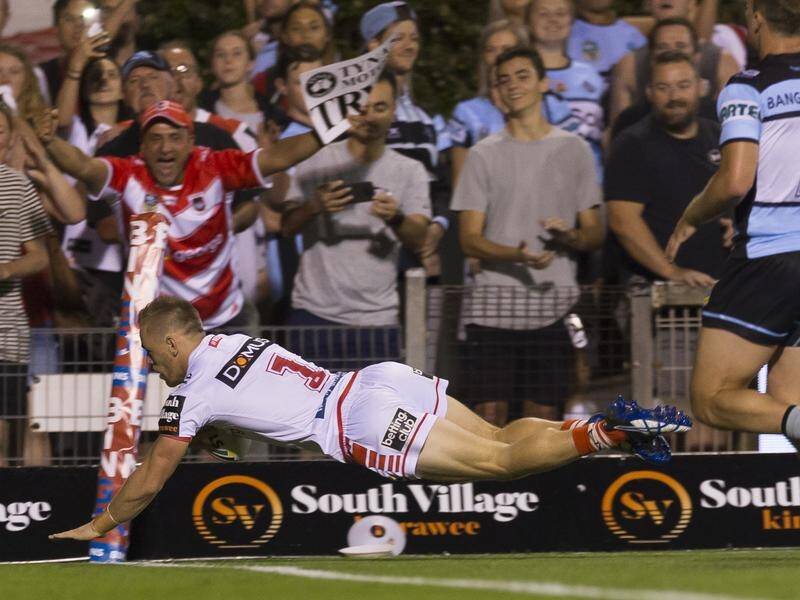 Matthew Dufty has impressed with two tries in St George-Illawarra's 40-20 NRL win over Cronulla.